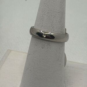 NWOT Size 6 Stainless steel band with solitaire zircon stone